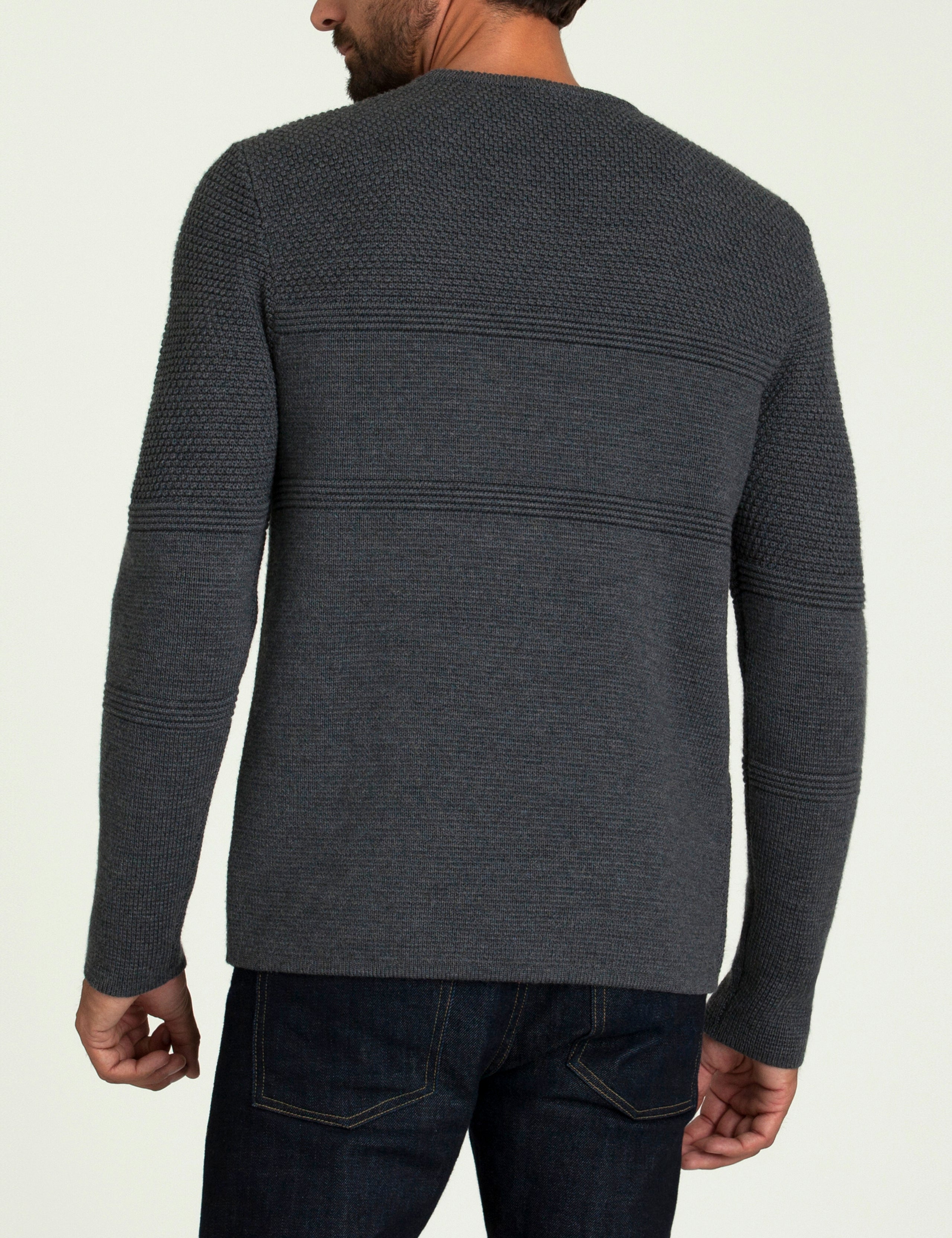 Rear body view of man wearing Cooper Sweater in Dark Charcoal Heather from AETHER Apparel.