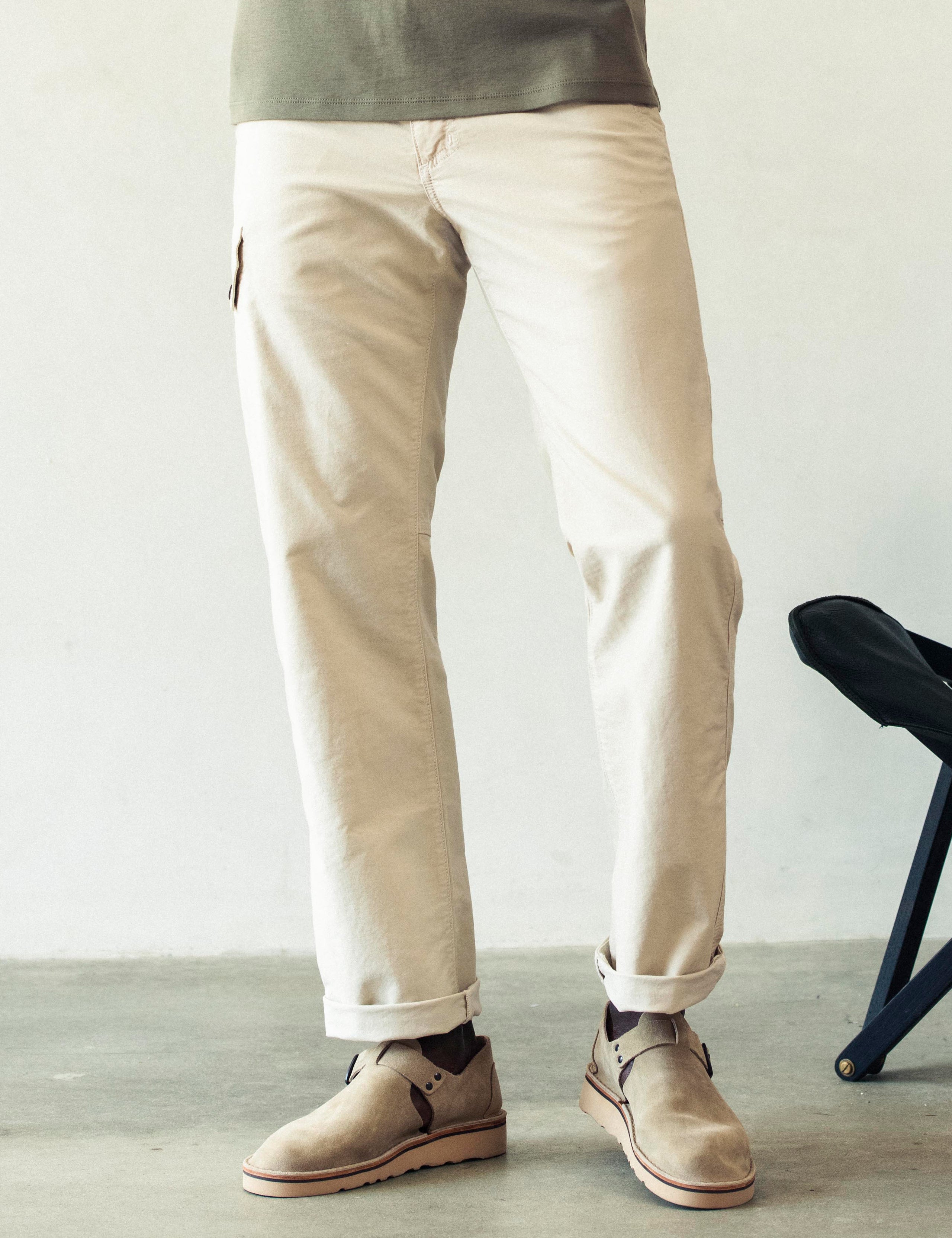 Front lower body view of man wearing Fairfax Pant 2.0 in Bone white from AETHER Apparel.