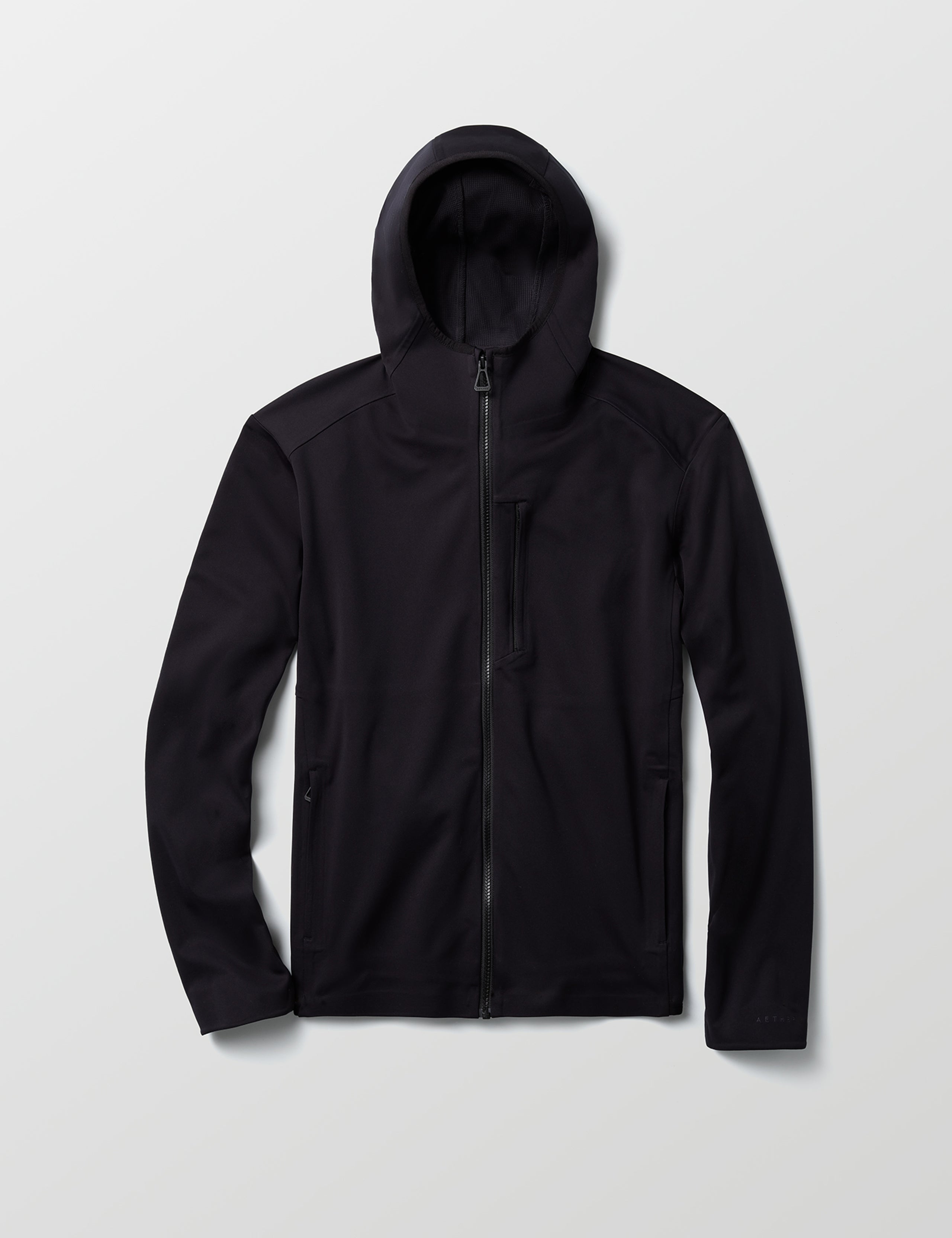Flat lay of Hooded Tech-Fleece Full-Zip in Onyx Black from AETHER Apparel.