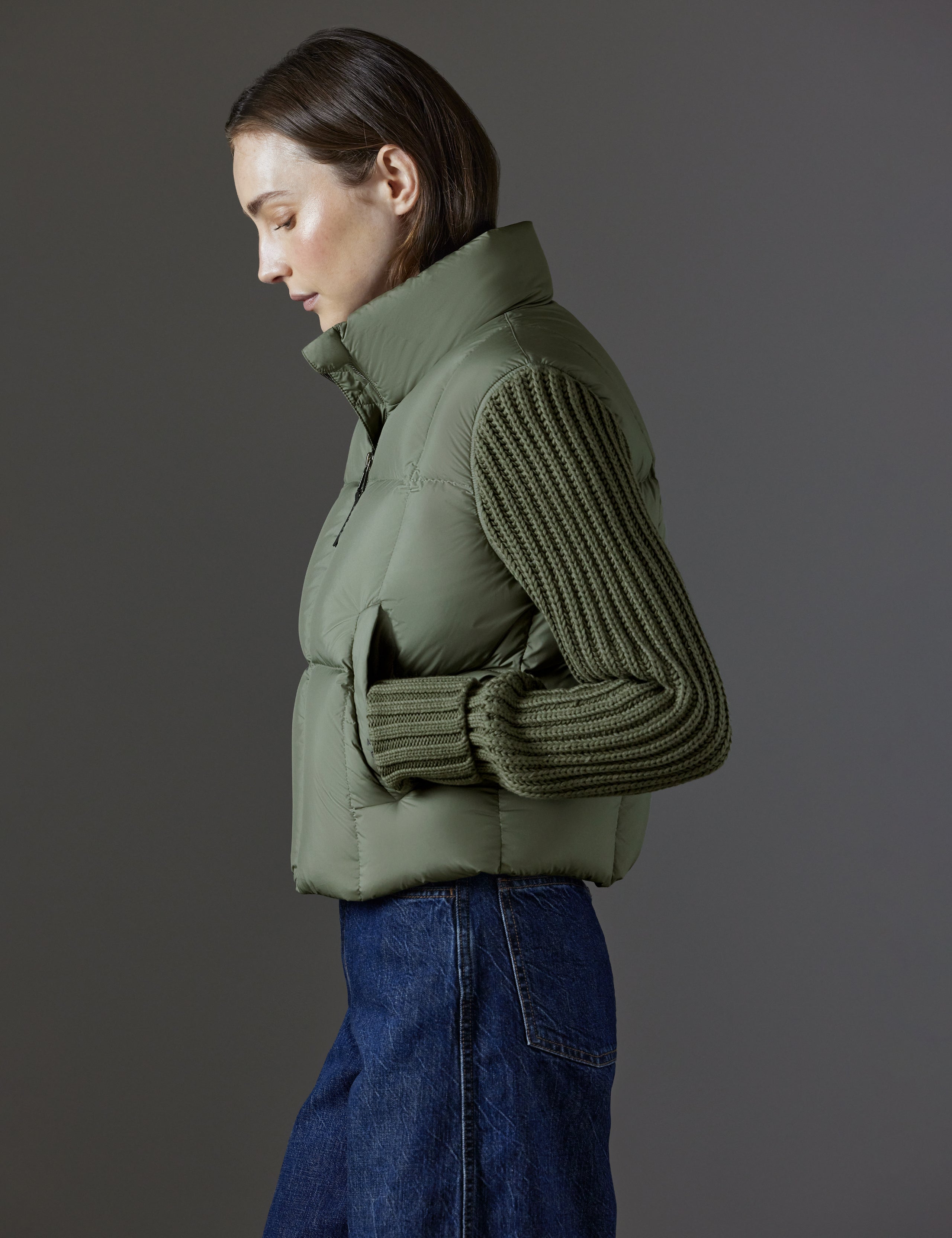 Side profile view of woman wearing Nina Cardigan-Sleeve Jacket in Fern Green from AETHER Apparel.