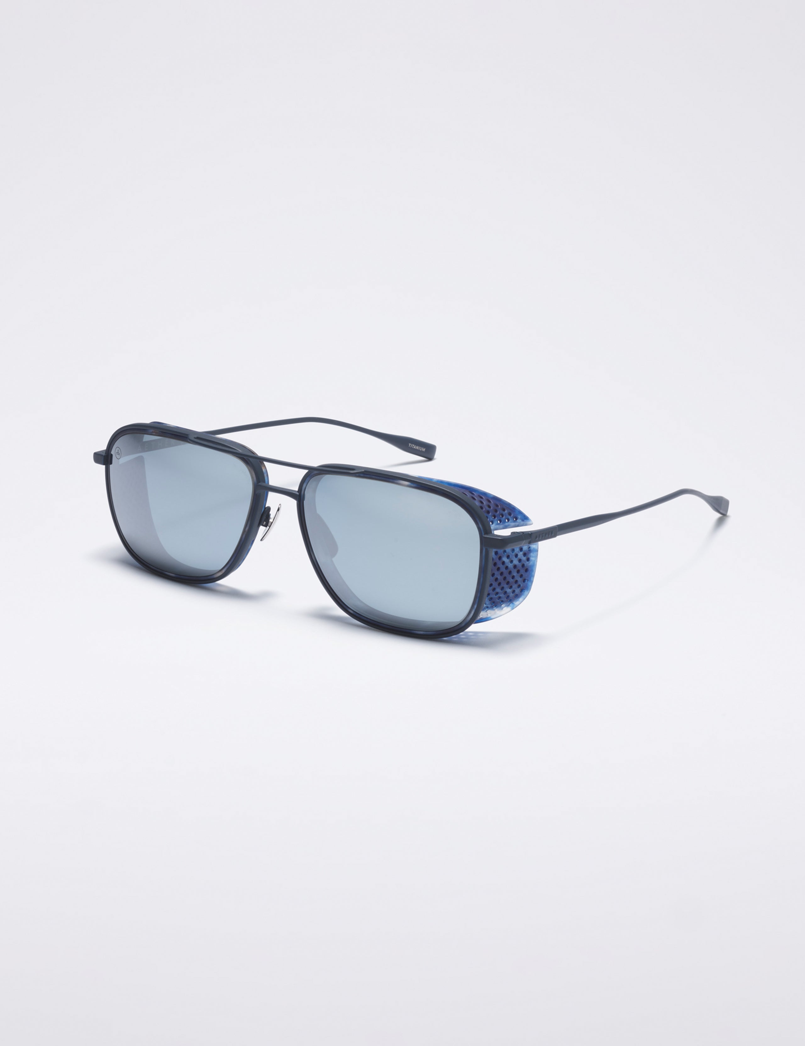 Front 3/4 view of Summit Sunglass in Blue titanium with Blue Lens from AETHER Apparel.